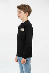 Boy's Oversized Sweatshirt With A Round Neck And Graphic Print On The Back
