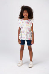 Girls Blouse With Ruffles And A Round Neck In Orange