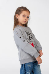 Girls' sweatshirt with a round neck and a print on the front
