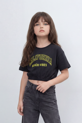 Girl’s Tomato Store Cali Beach Cropped T-Shirt Front Collegiate California Typography Beach Vibes Slogan Plain Body Elastic Gathered Hem Slim Fit