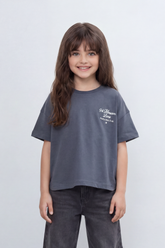 Girls’ Tomato Store Oversize T-Shirt With Smooth Jersey Texture Soft Washed Surface Small Chest Script Print Front Cropped