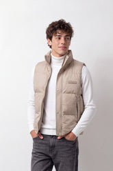 Men's Tomato Store Slim Fit Puffer Vest Sleeveless High Neck Snap Zip Front Ribbed Trim Chest Badge Detail