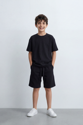Boy's Tomato Store Canyon Ease Co-Ord Outfit Set Plain Dyed Surface With Soft Washed Grain Across The Full Look Oversize
