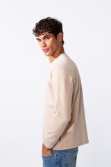 Men's plain essential round neck slim fit sweatshirt in beige with ribbed cuffs.