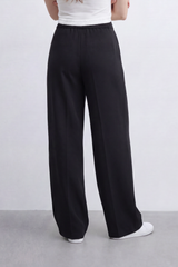 Women’s Tomato Store Soft Track Wide Sweatpants Smooth Brushed Texture Across A Plain Surface Center Seam Lines