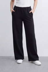 Women’s Tomato Store Soft Track Wide Sweatpants Smooth Brushed Texture Across A Plain Surface Center Seam Lines