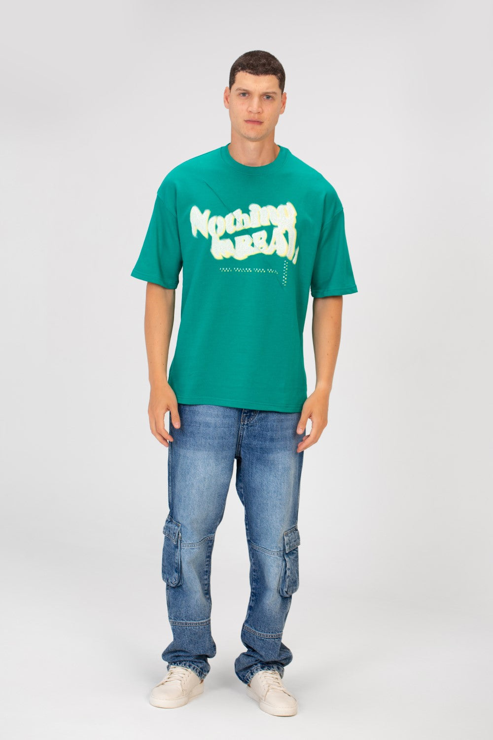 تيشيرت رجالي اوفر سايز بياقة دائرية وأكمام قصيرة بطباعة نصية على الأمام من خامة ميلتون
