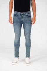 Men's Skinny Used Jeans Pants With Five Pockets And Badge Tomato In The Back