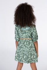 Girls Green Floral Dress With A Belt At The Waist And A Collar With Colorful Buttons On The Front