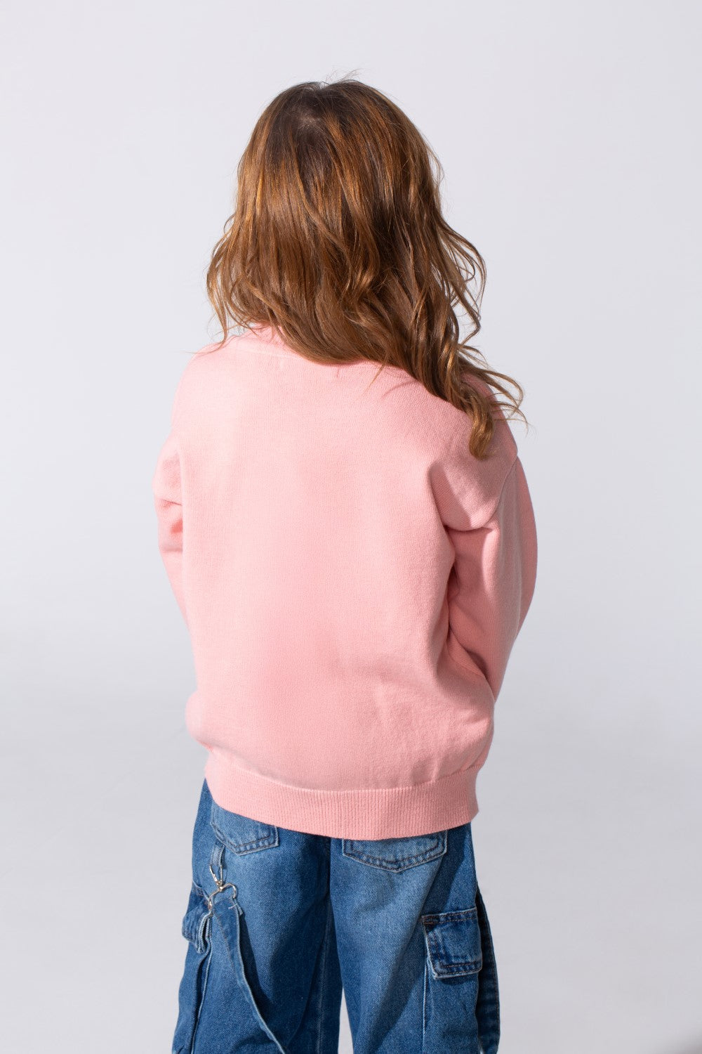 Girl's Long Sleeved Pullover With A Bow Print On The Front And A Round Neck