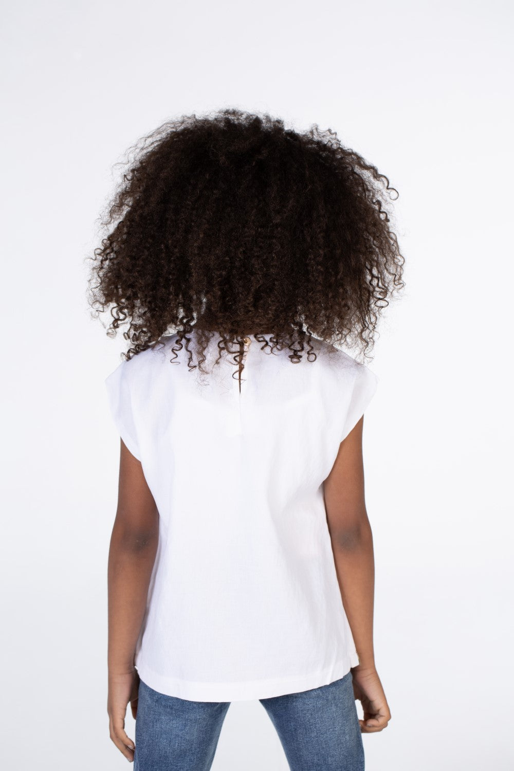 Girls Cut Blouse With A Round Neck And A Butterfly Print On The Front