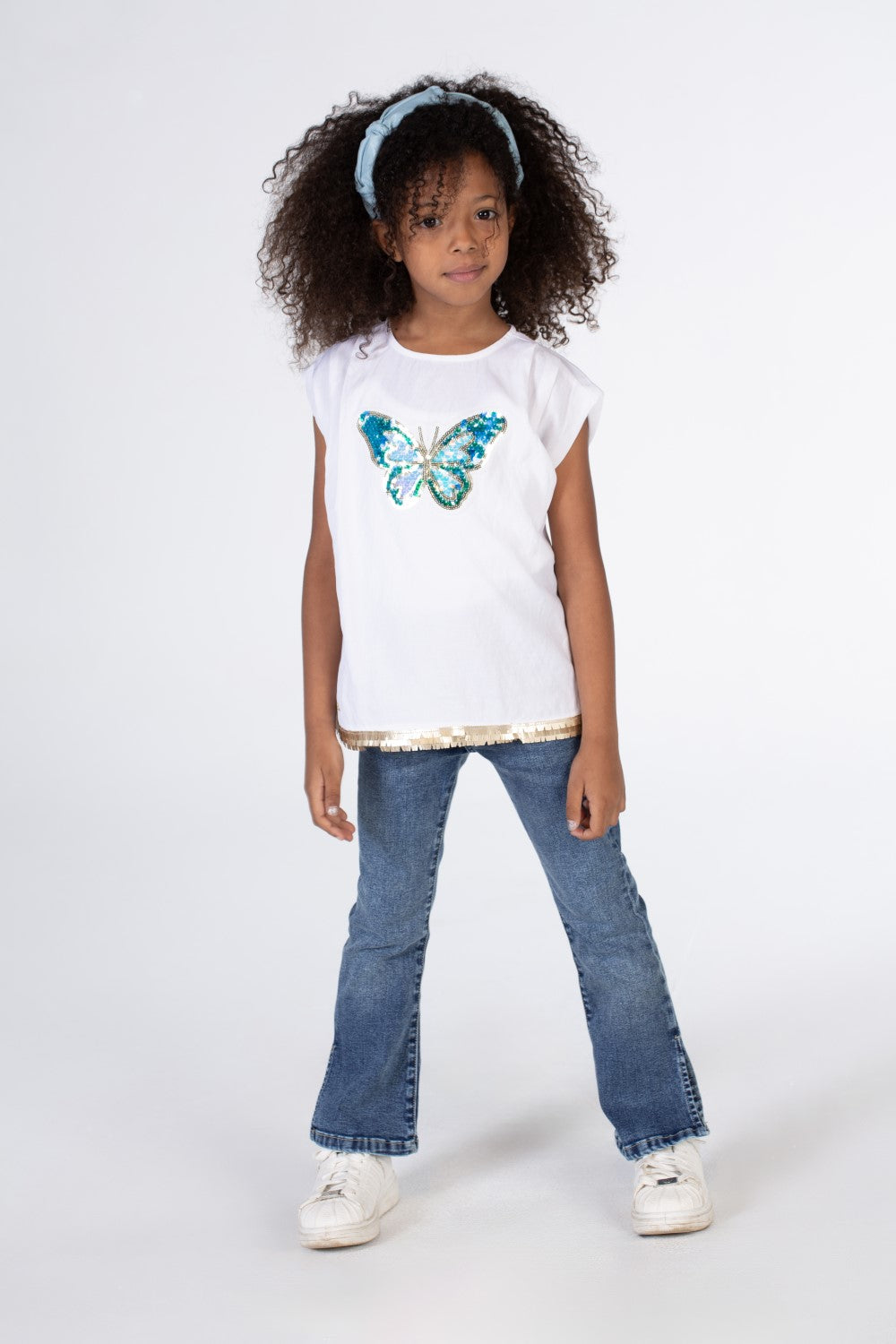 Girls Cut Blouse With A Round Neck And A Butterfly Print On The Front