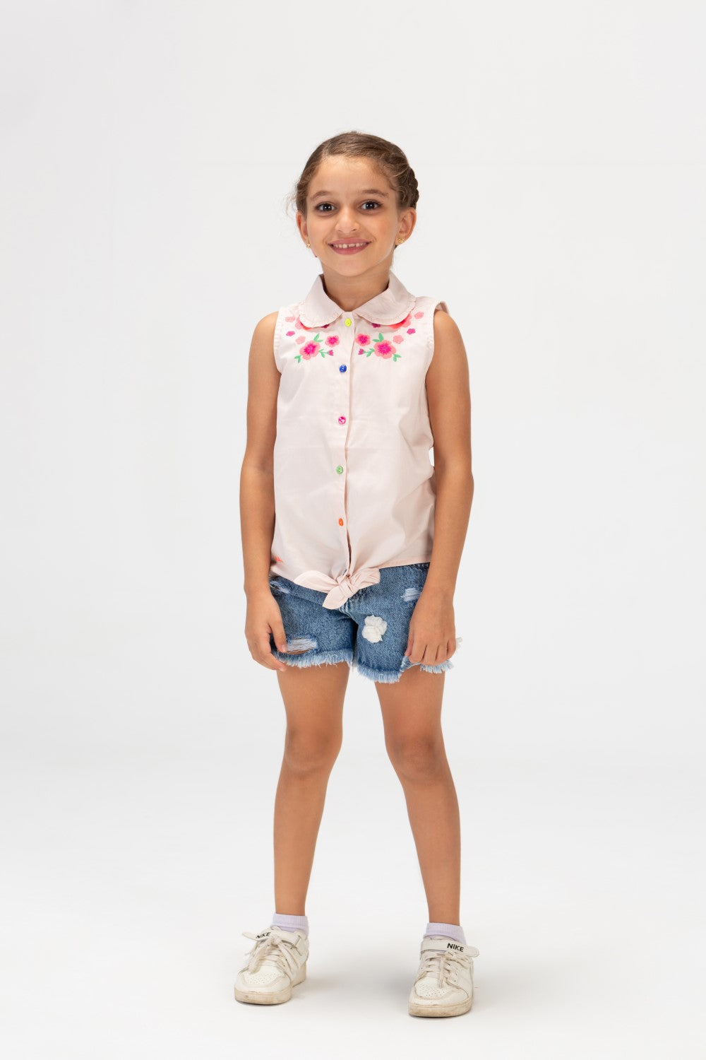 Girls Printed Blouse With Colored Front Buttons And Without Sleeves In Pink