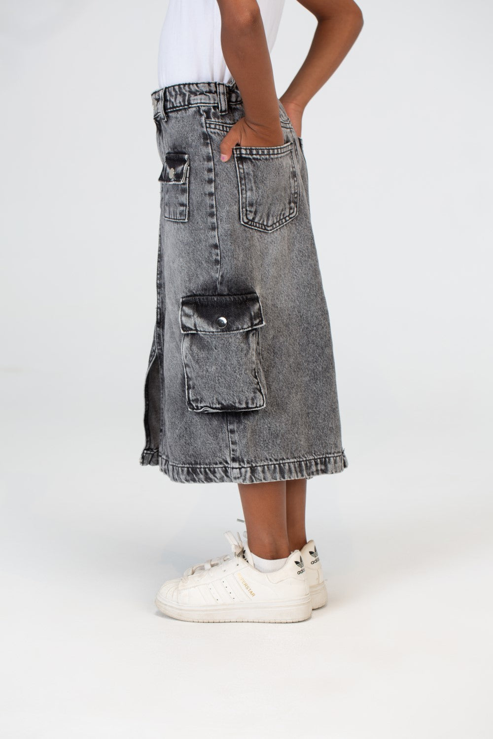 Girls Slouchy Jeans Skirt With A Trendy Pocket And A Unique Cut