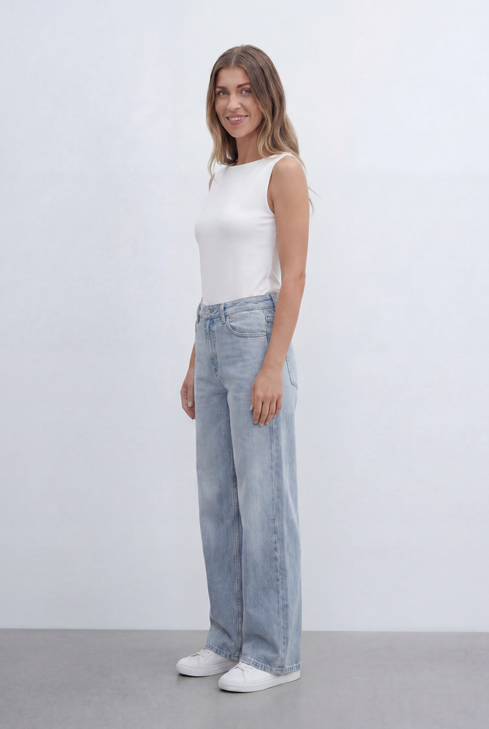 Women’s Tomato Store Sleeveless Top Featuring Clean Minimal Design