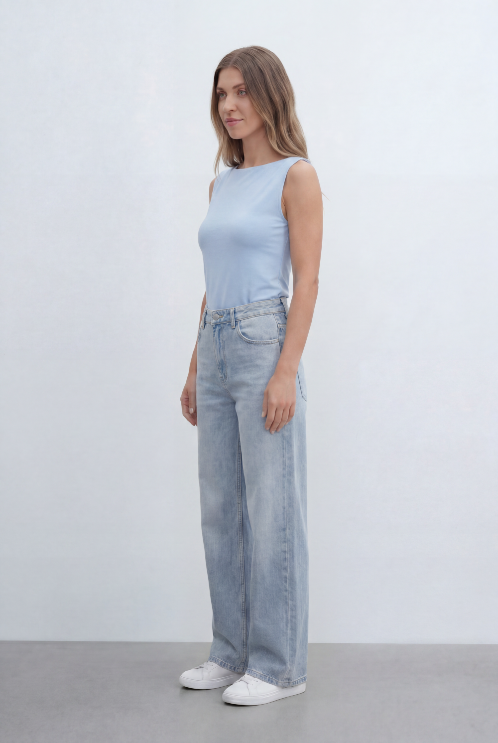 Women’s Tomato Store Sleeveless Top Featuring Clean Minimal Design