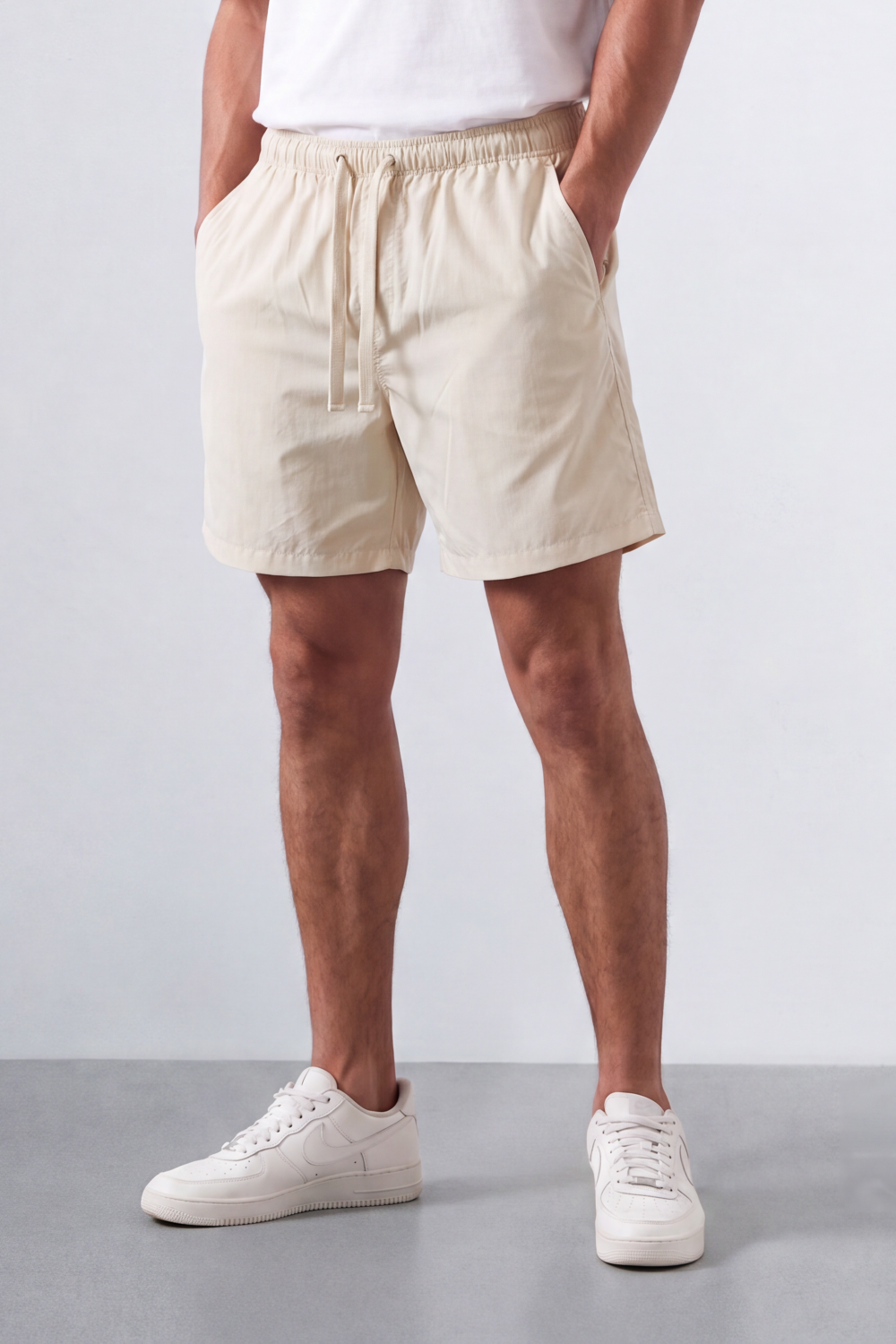 Men’s Tomato Store Shoreline Pull On Shorts Light Crinkle Surface Elastic Waist Rope Drawcord Side Pockets Back Patch Pocket Eyelet Detail Regular Fit Waterproof Above Knee Shape