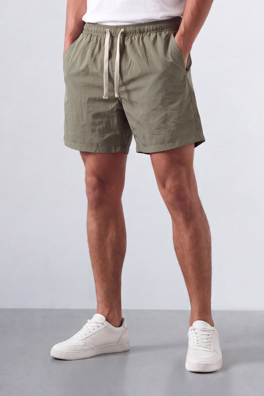 Men’s Tomato Store Shoreline Pull On Shorts Light Crinkle Surface Elastic Waist Rope Drawcord Side Pockets Back Patch Pocket Eyelet Detail Regular Fit Waterproof Above Knee Shape