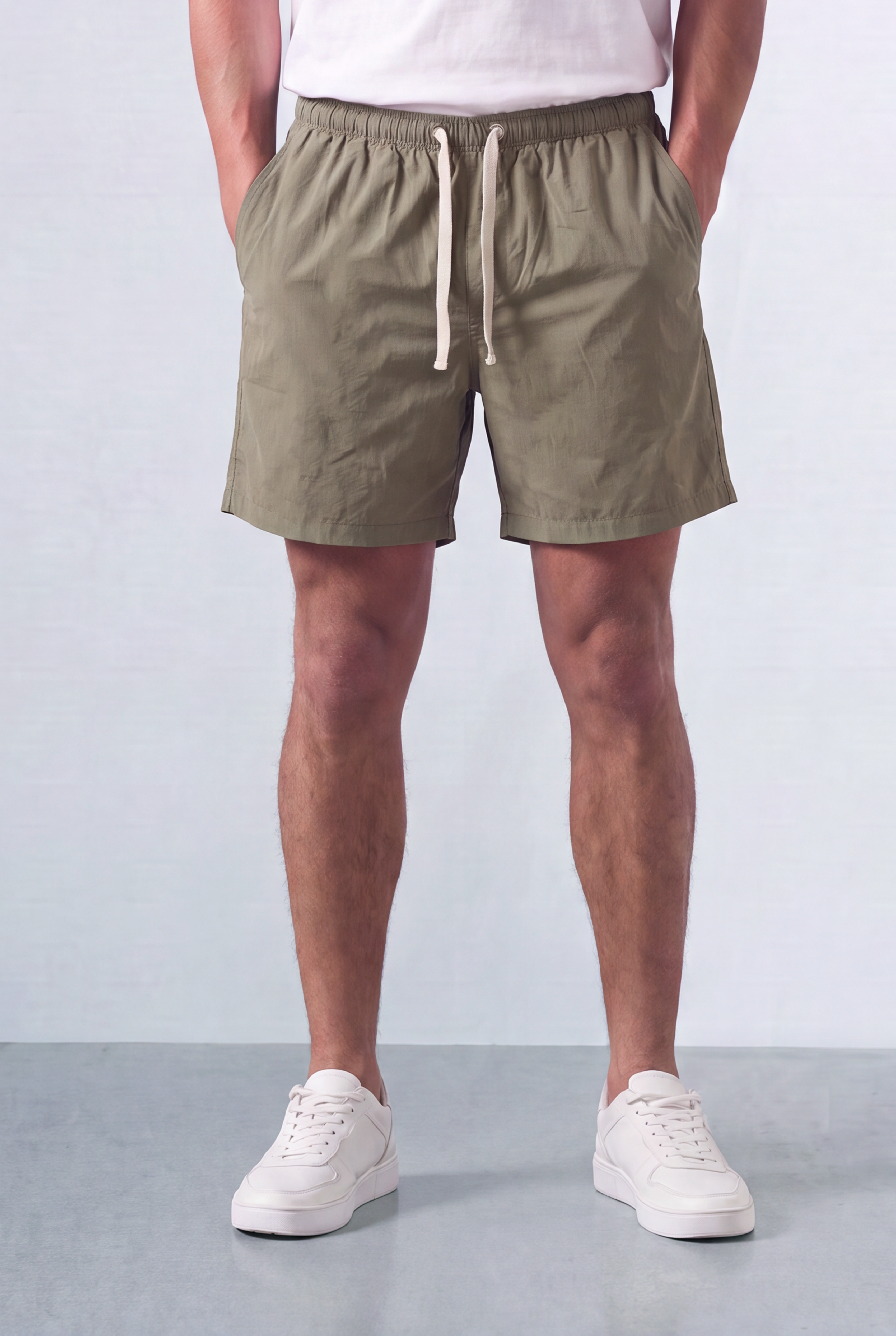 Men’s Tomato Store Shoreline Pull On Shorts Light Crinkle Surface Elastic Waist Rope Drawcord Side Pockets Back Patch Pocket Eyelet Detail Regular Fit Waterproof Above Knee Shape