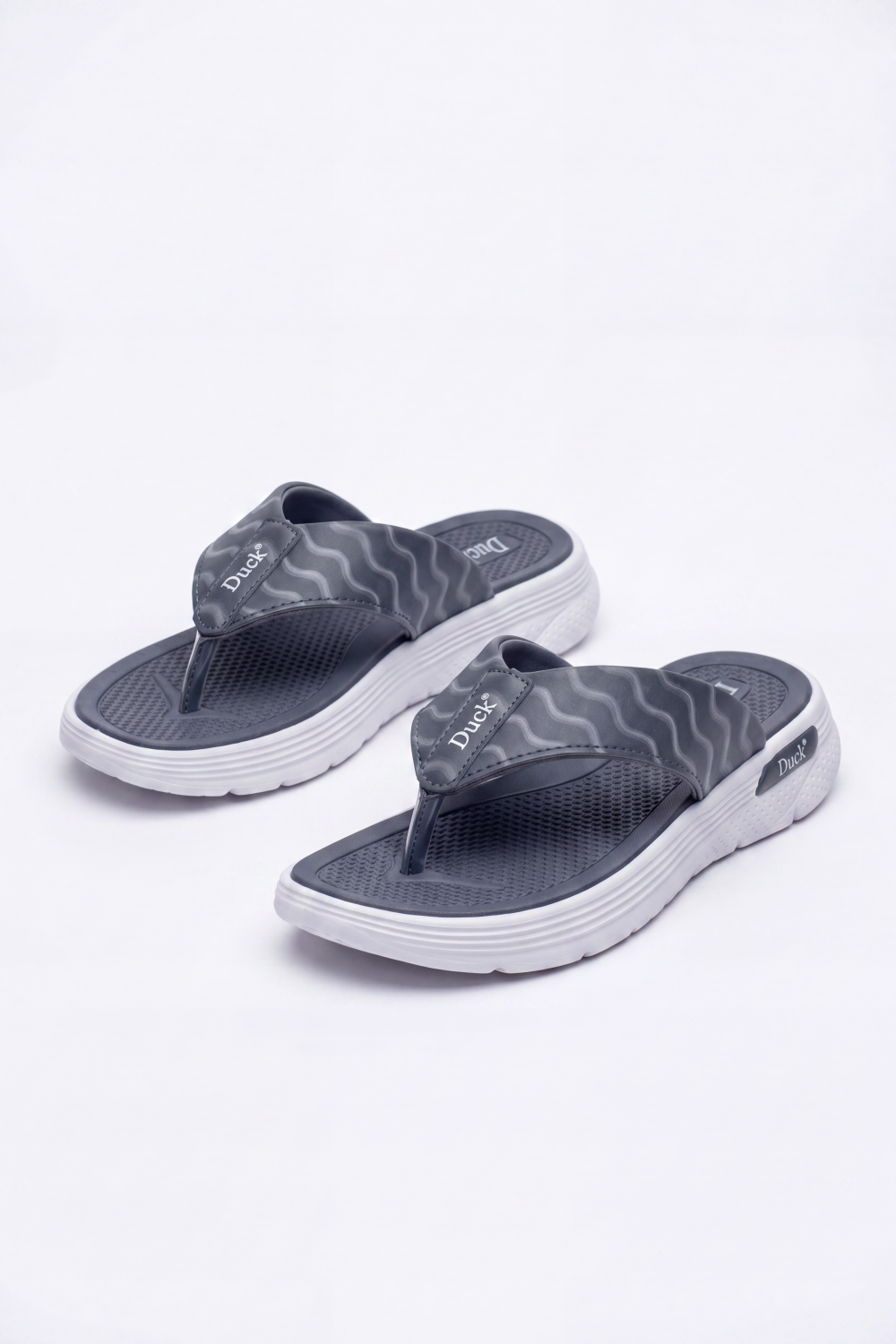 Women's Tomato Store Wave Grip Flip Flops Wavy Strap Print With Textured Footbed Raised Logo Detail Toe Post Shape Duck Slipper