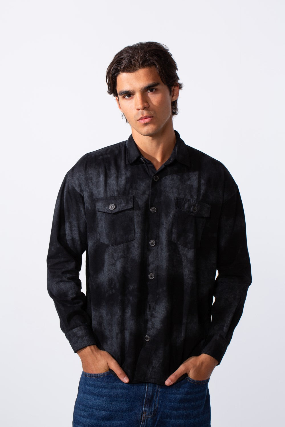 Men's regular fit washed gabardine shirt in black tie-dye with front pockets and long sleeves.