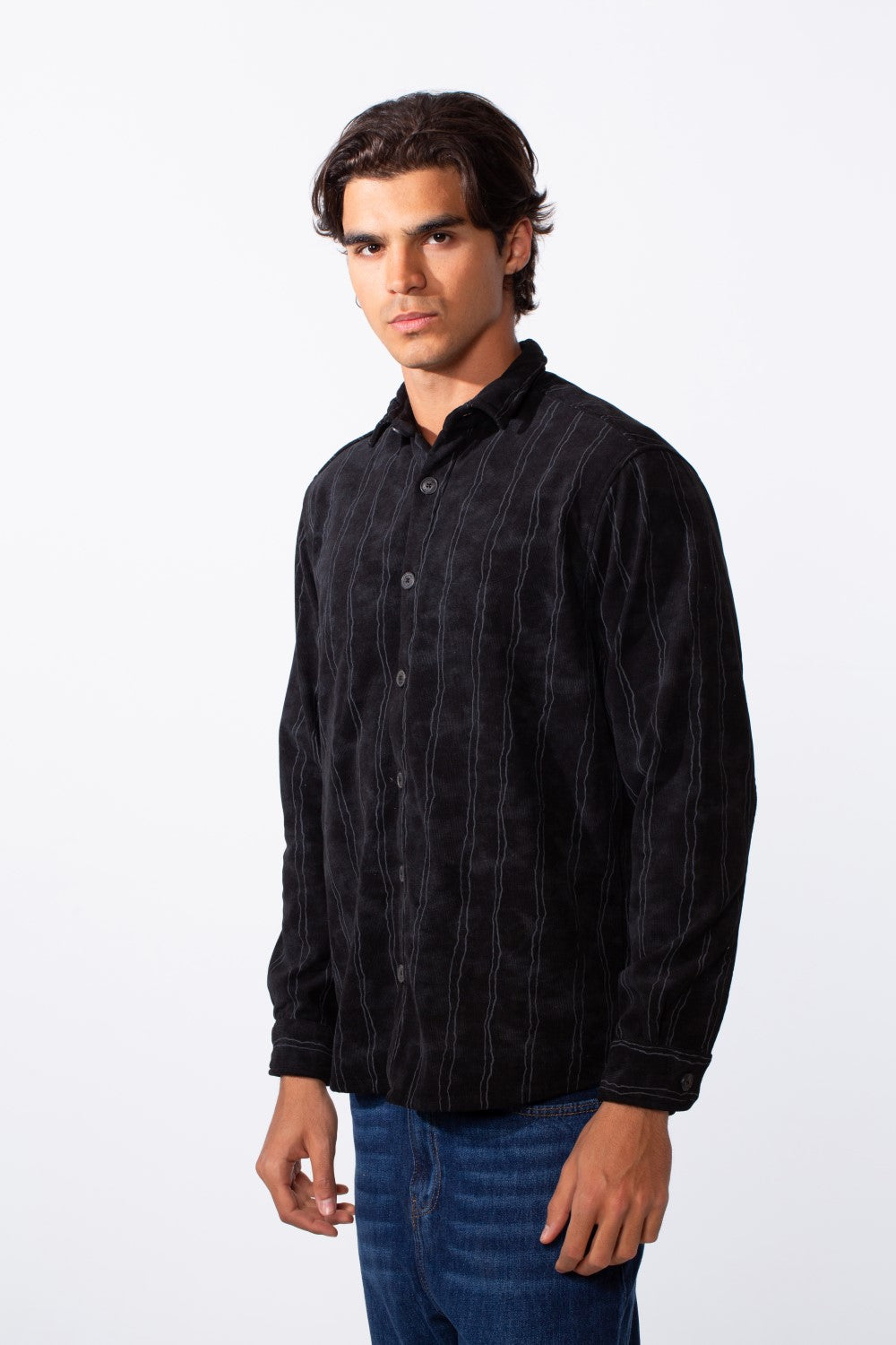 Men's slim fit long sleeve black velvet shirt with subtle vertical stripes and button-down front.
