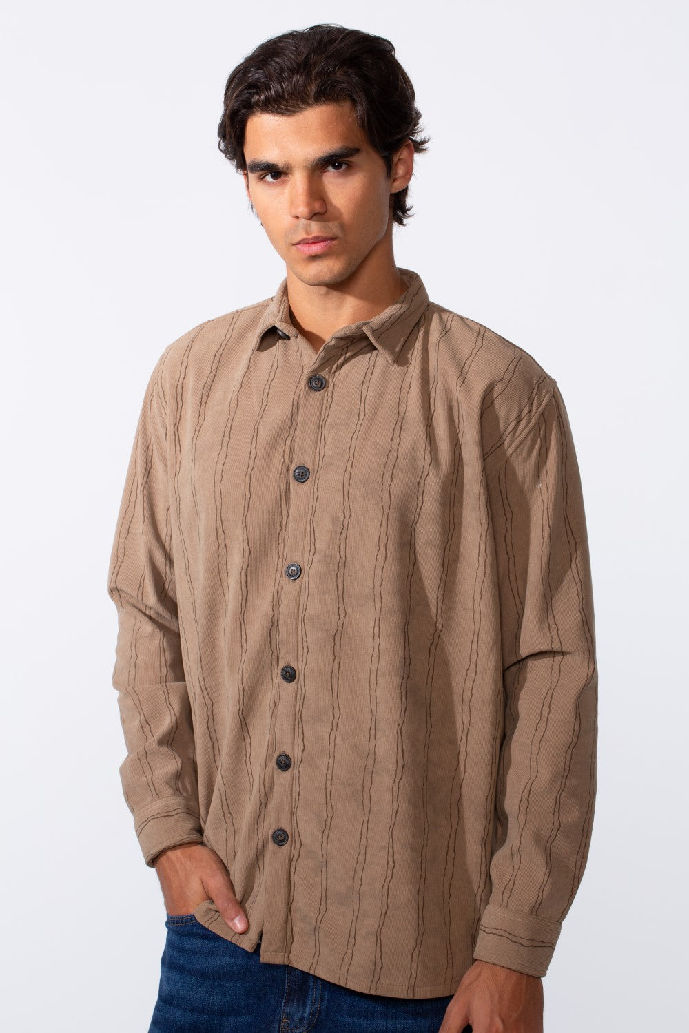 Men's slim fit long sleeve velvet shirt in tan with dark vertical wavy stripes.