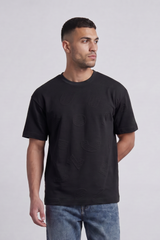 Men’s Tomato Store Ghost Emblem T-Shirt Tonal Raised Symbol Motifs Spread Across A Fine Ripple Surface Relaxed Fit