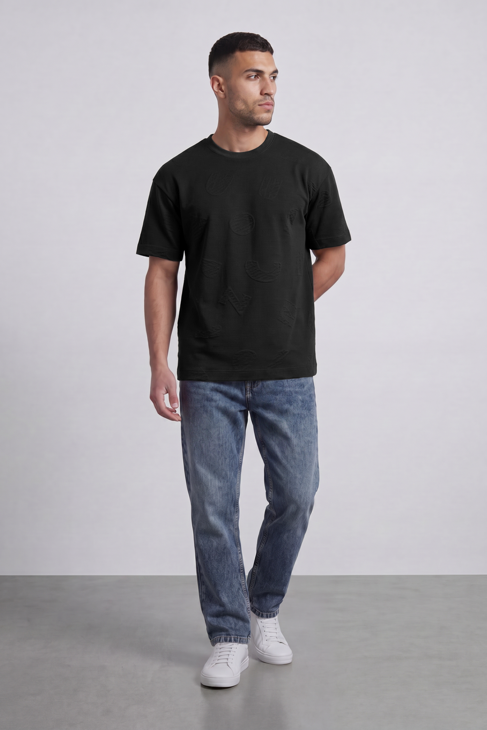 Men’s Tomato Store Ghost Emblem T-Shirt Tonal Raised Symbol Motifs Spread Across A Fine Ripple Surface Relaxed Fit