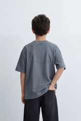 Boy's Tomato Store Slash Mark Oversized T-Shirt Tonal Broken Scratch Texture Scattered Across The Front Clean Solid Base Oversize