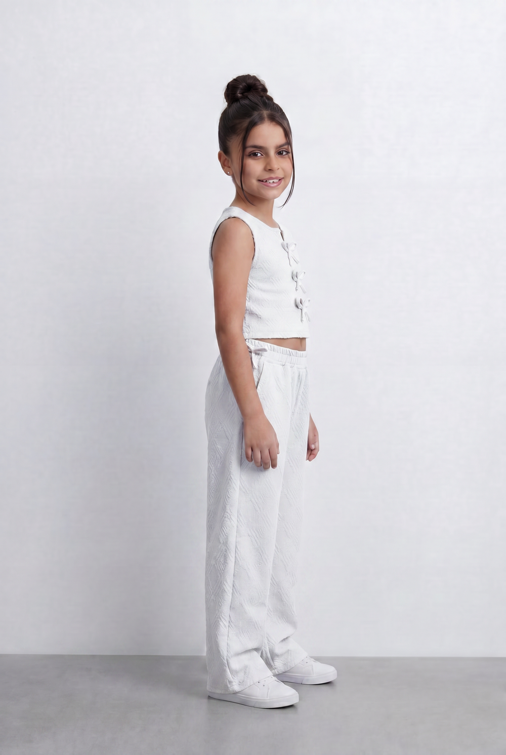 Girls Textured Co-Ord Set Sleeveless Crop Top With Front Bow Tie Details Embossed Fabric Elastic Waistband Outfit