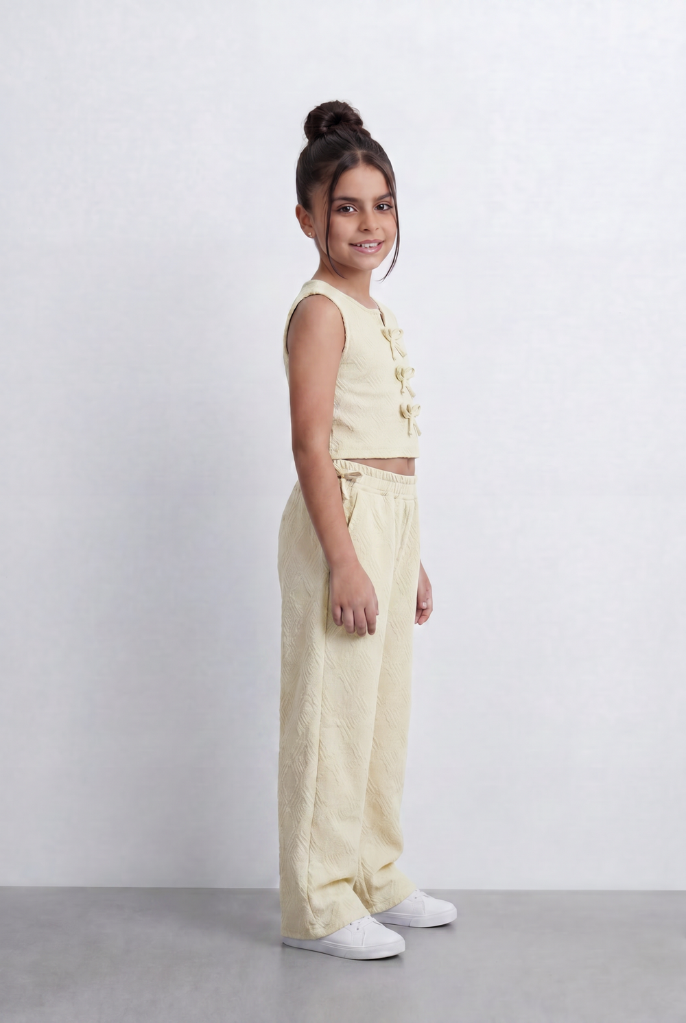 Girls Textured Co-Ord Set Sleeveless Crop Top With Front Bow Tie Details Embossed Fabric Elastic Waistband Outfit