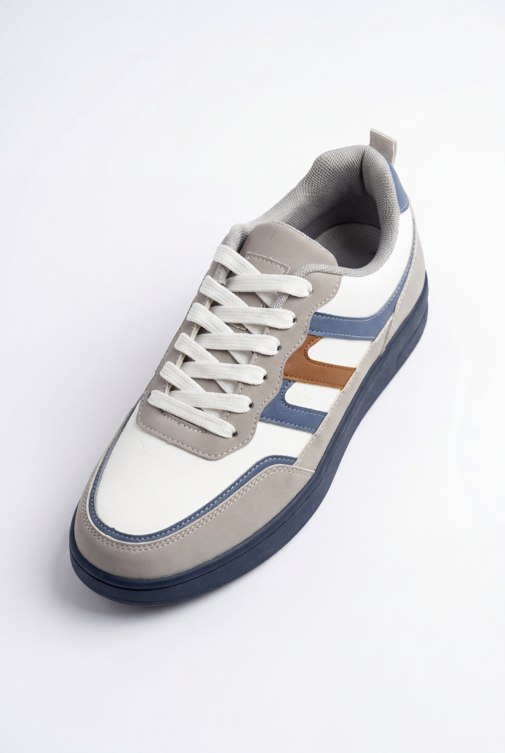 Men’s Multi Texture Sneaker Multi Layered Upper Padded Mesh Interior Classic Lace-Up System Precise fit Side Panels Accented Shoes