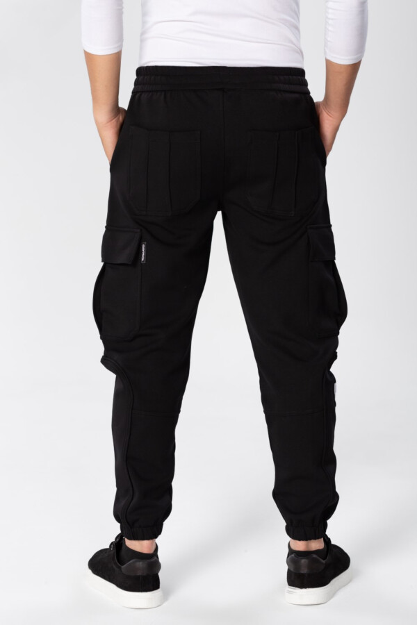 Men's Oversize Sweatpants With Side Pockets And An Elastic Band In The Middle