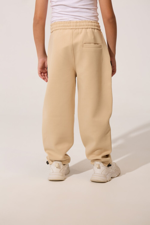 Boy's Wide Leg Tomato Sweatpants With A Modern Cut And Side Zip Pockets