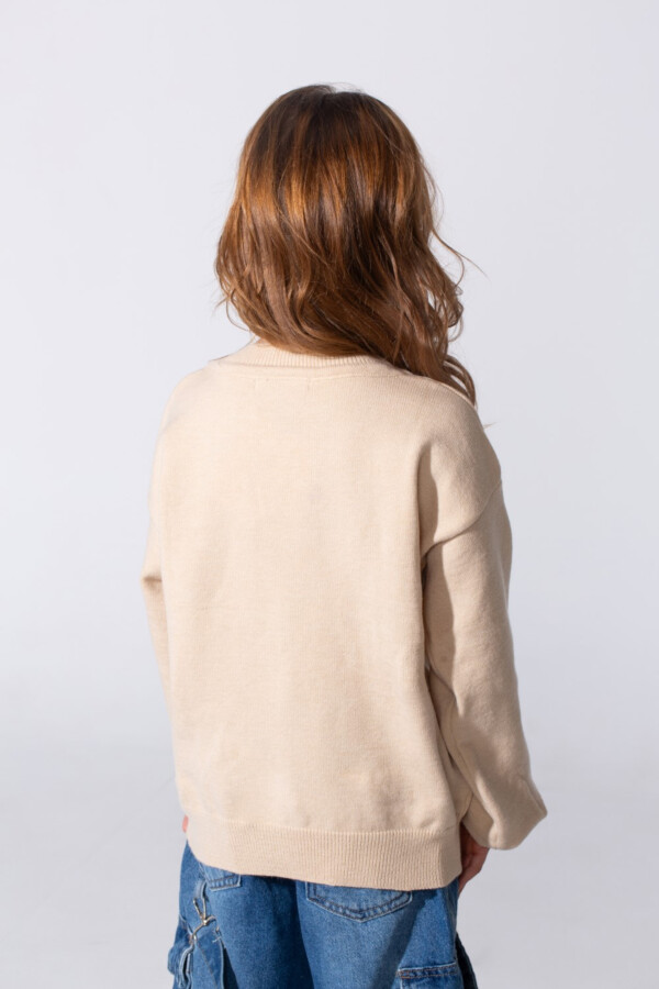 Girl's Long Sleeved Pullover With A Bow Print On The Front And A Round Neck