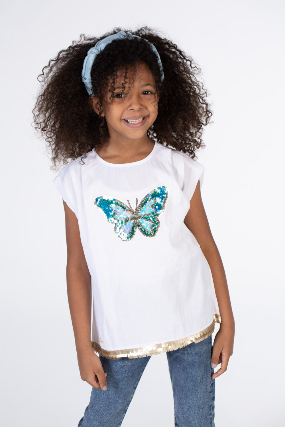Girls Cut Blouse With A Round Neck And A Butterfly Print On The Front