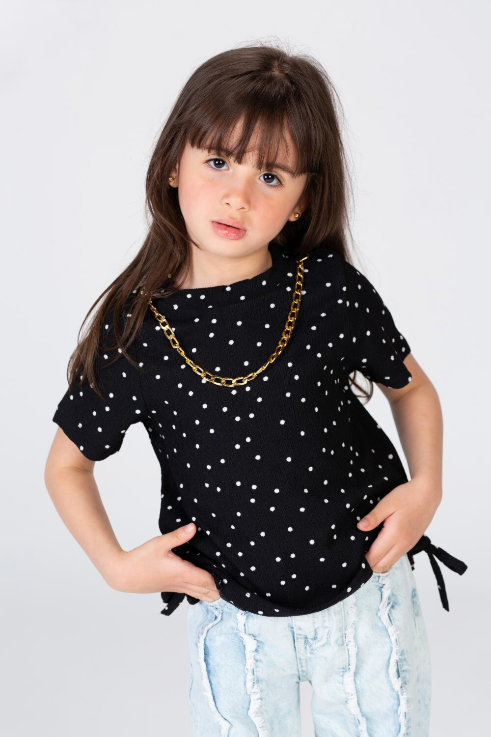 Girls Dotted Blouse With Elastic On The Side And A Necklace Around The Neck