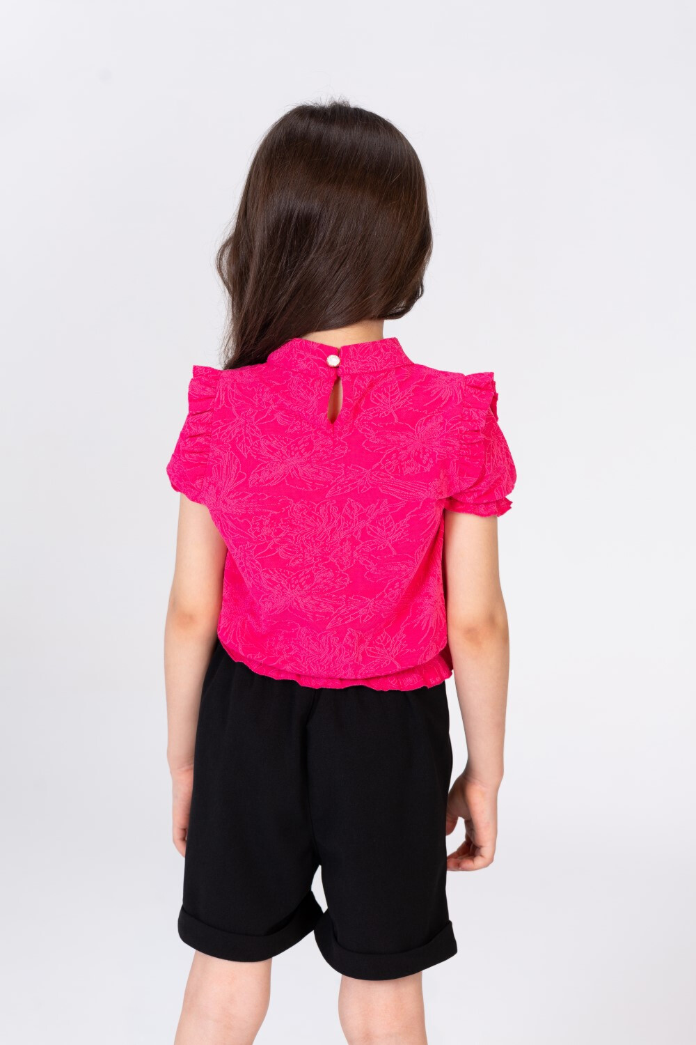 Girls Short And A Chic Blouse Outfit With A Unique Cut And Distinctive Details