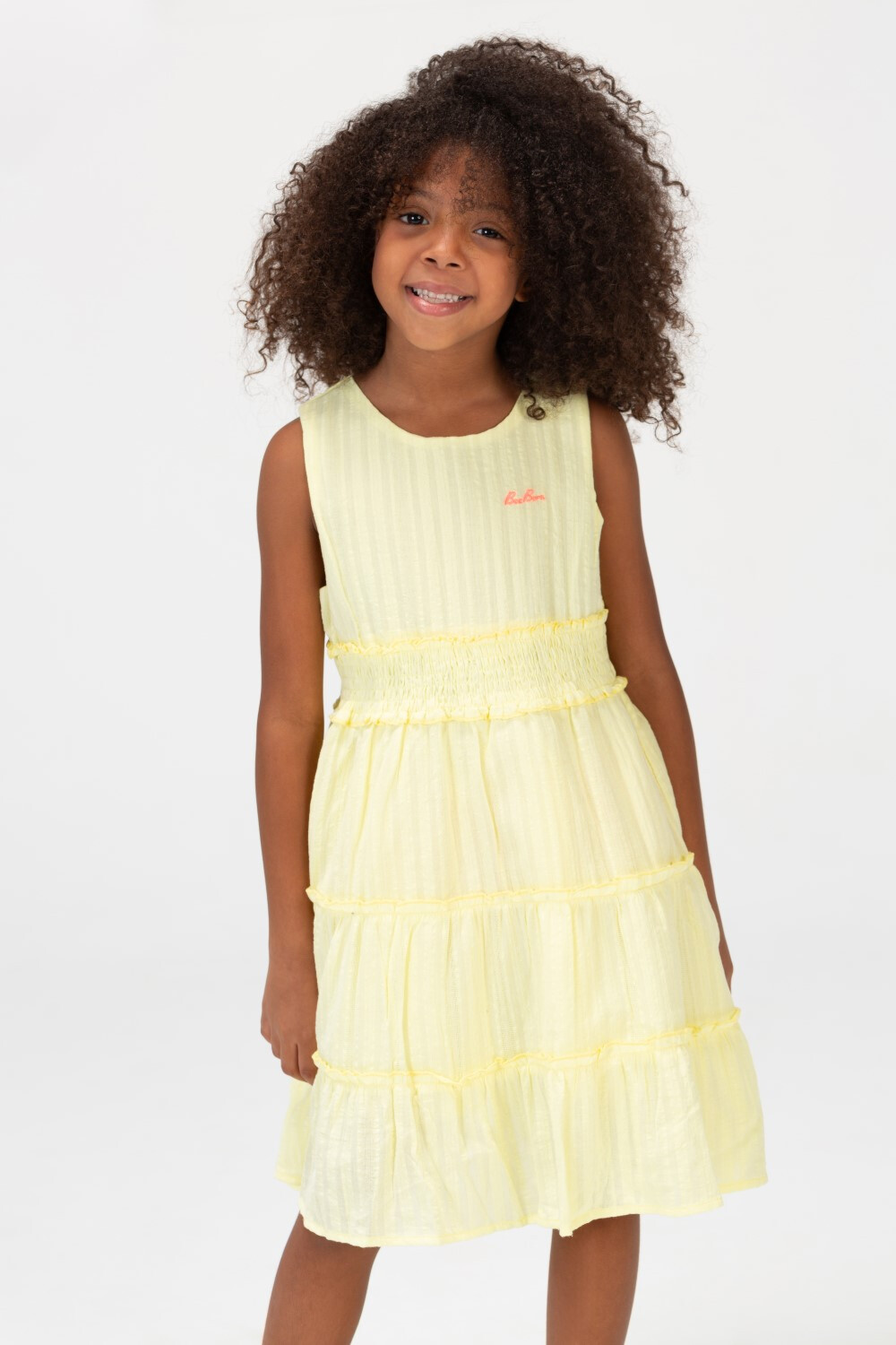 Girls Basic Sleeveless Fabric Dress With A Waist Belt At The Back In Yellow